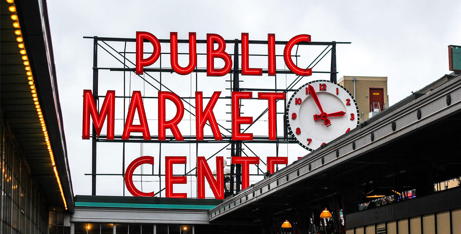 a clock on a sign