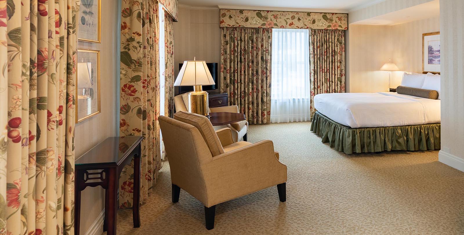 a room with a bed and a chair