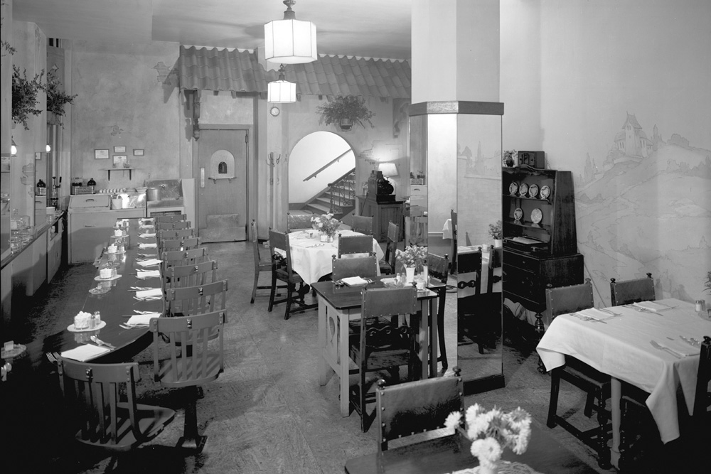 a room with tables and chairs