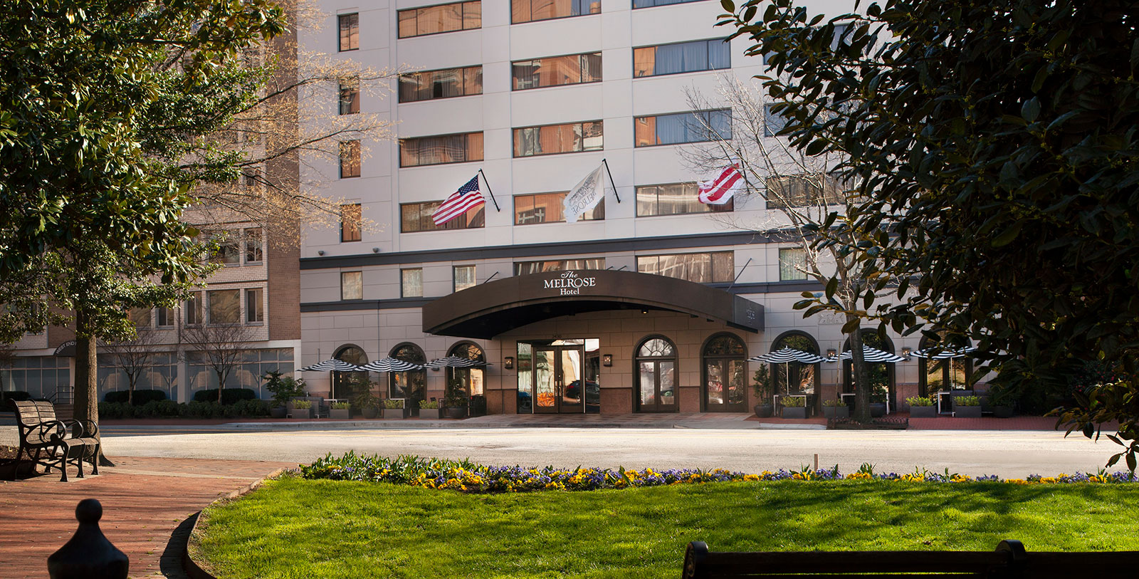 a building with flags on the front
