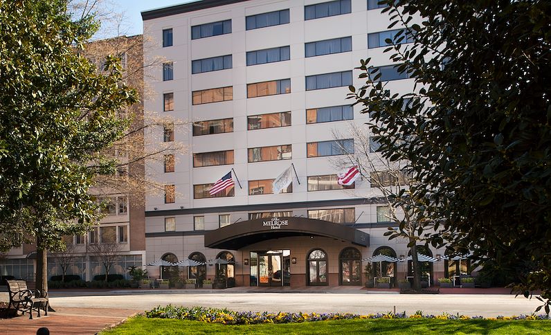 a building with flags in front of it