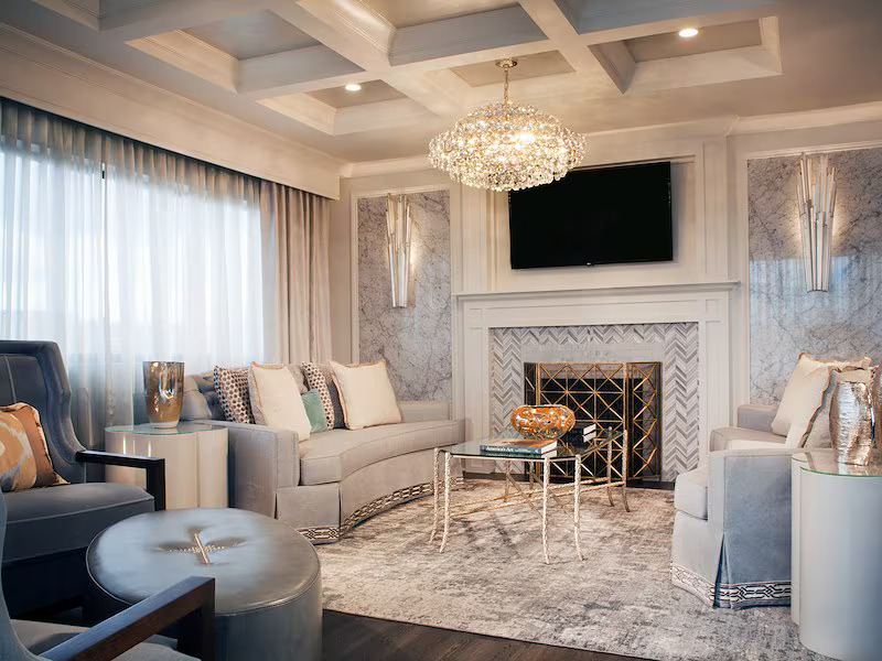 a living room with a fireplace and couches