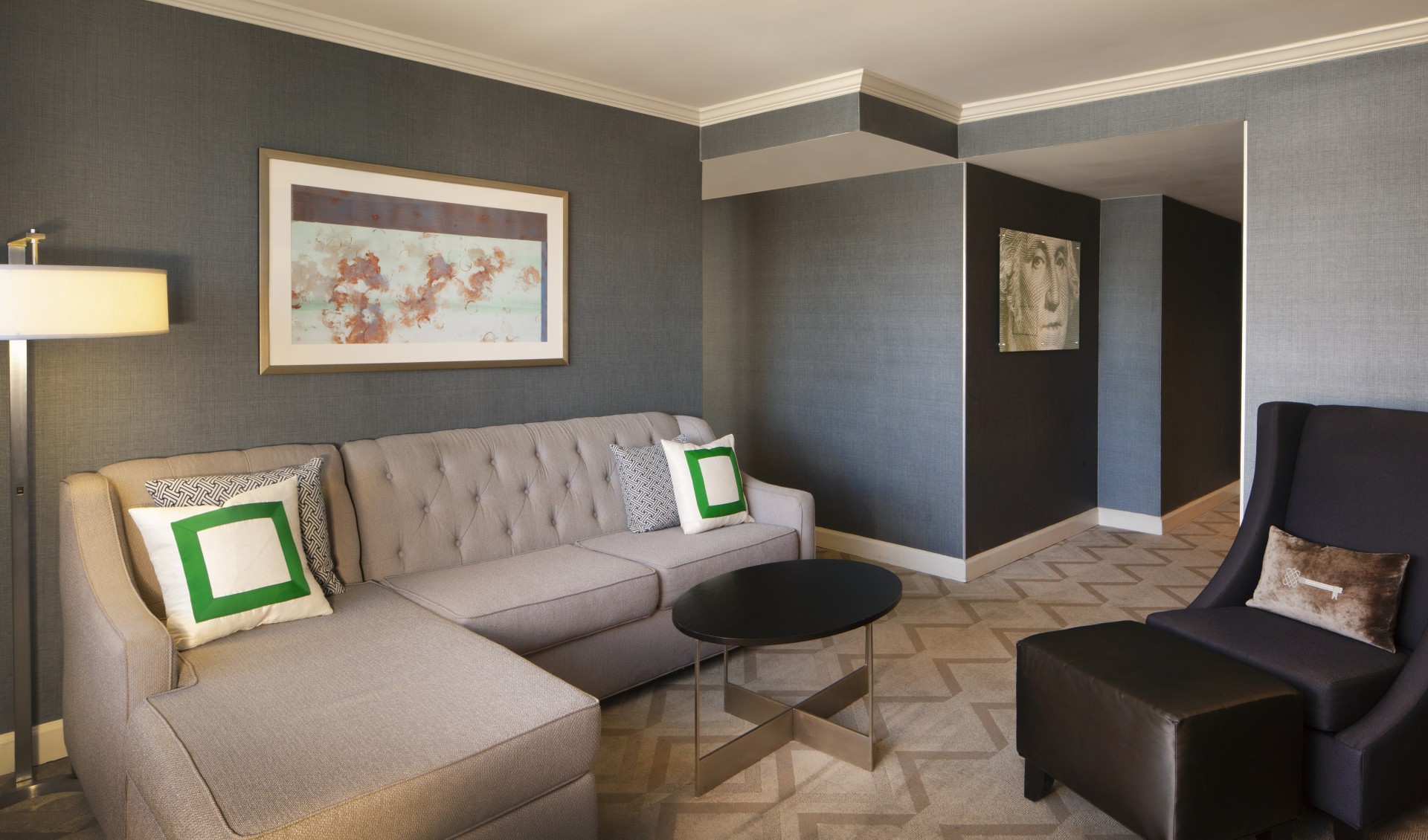 a living room with couches and a coffee table
