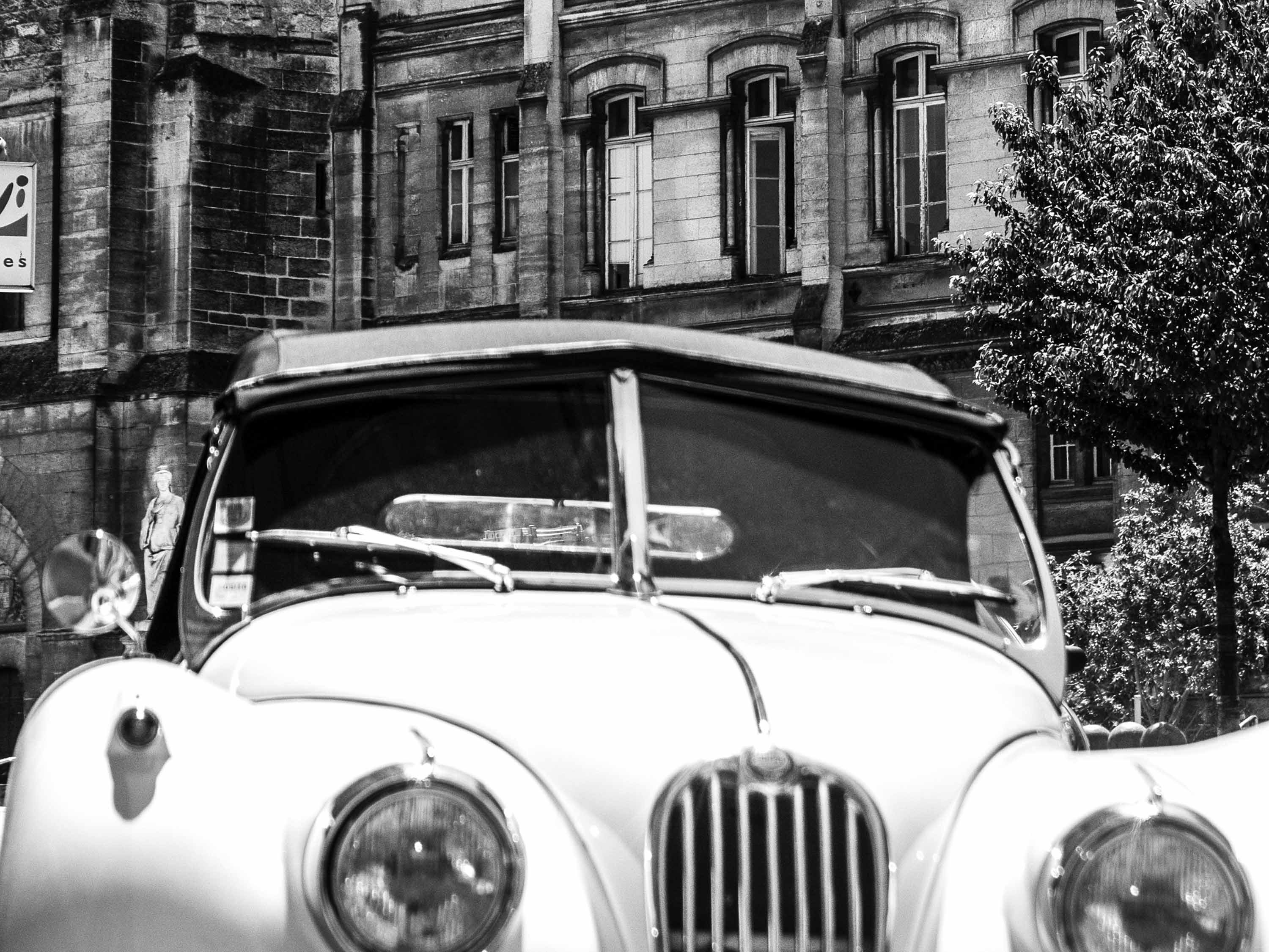 a car parked in front of a building