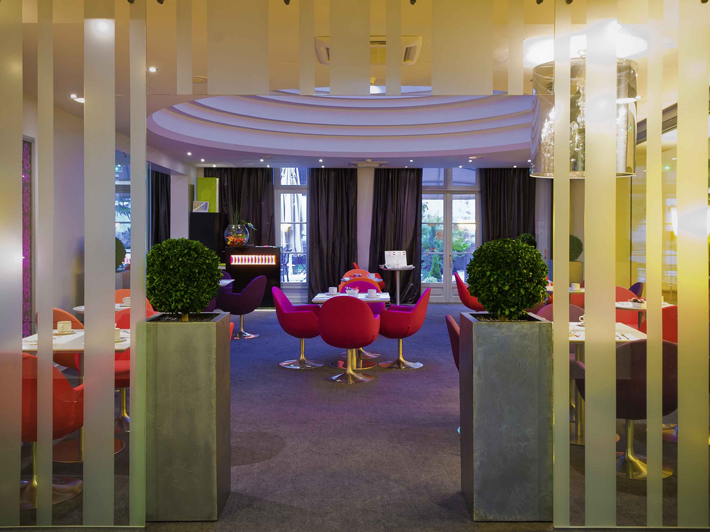 a room with tables and chairs