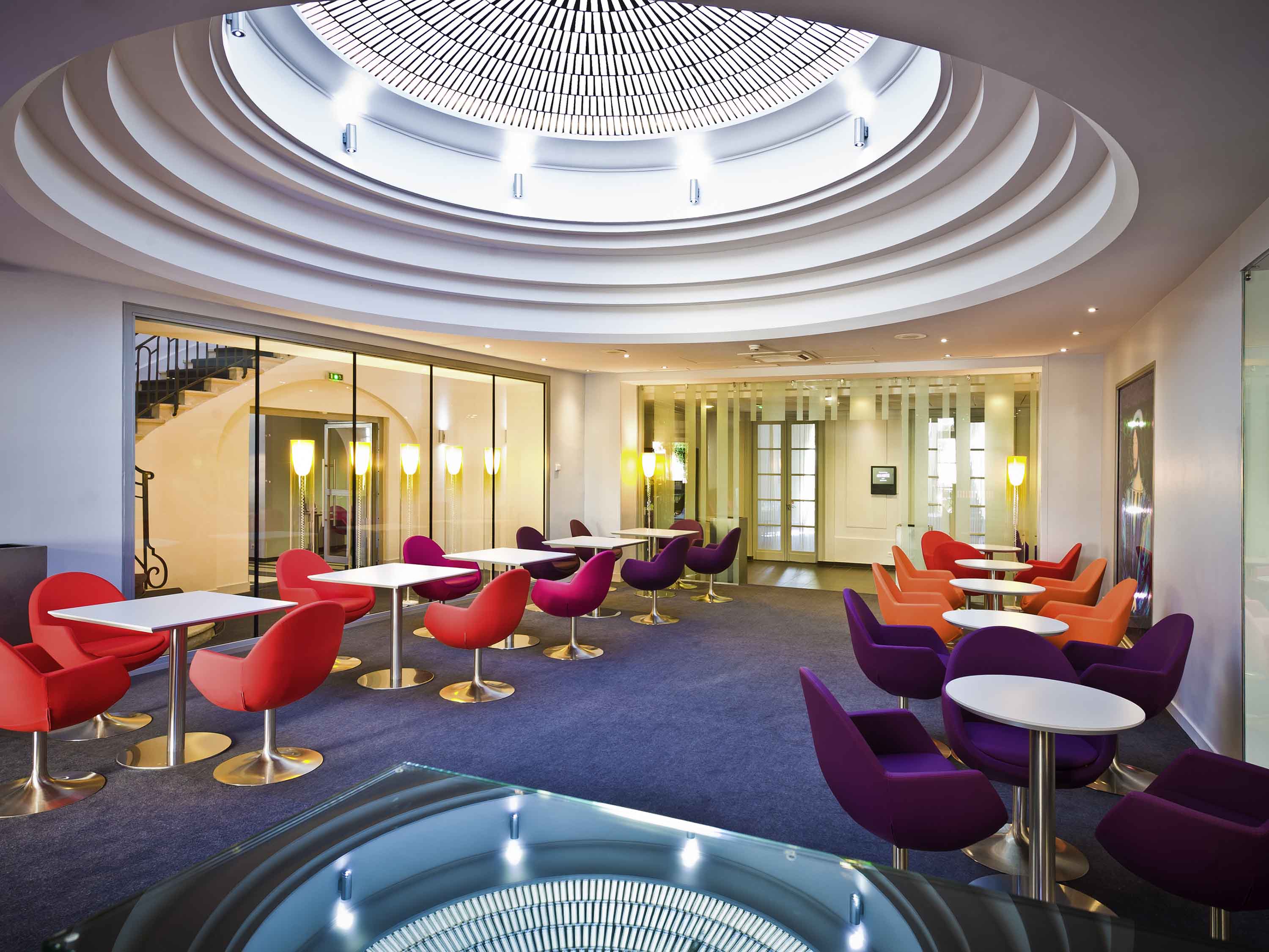 a room with tables and chairs