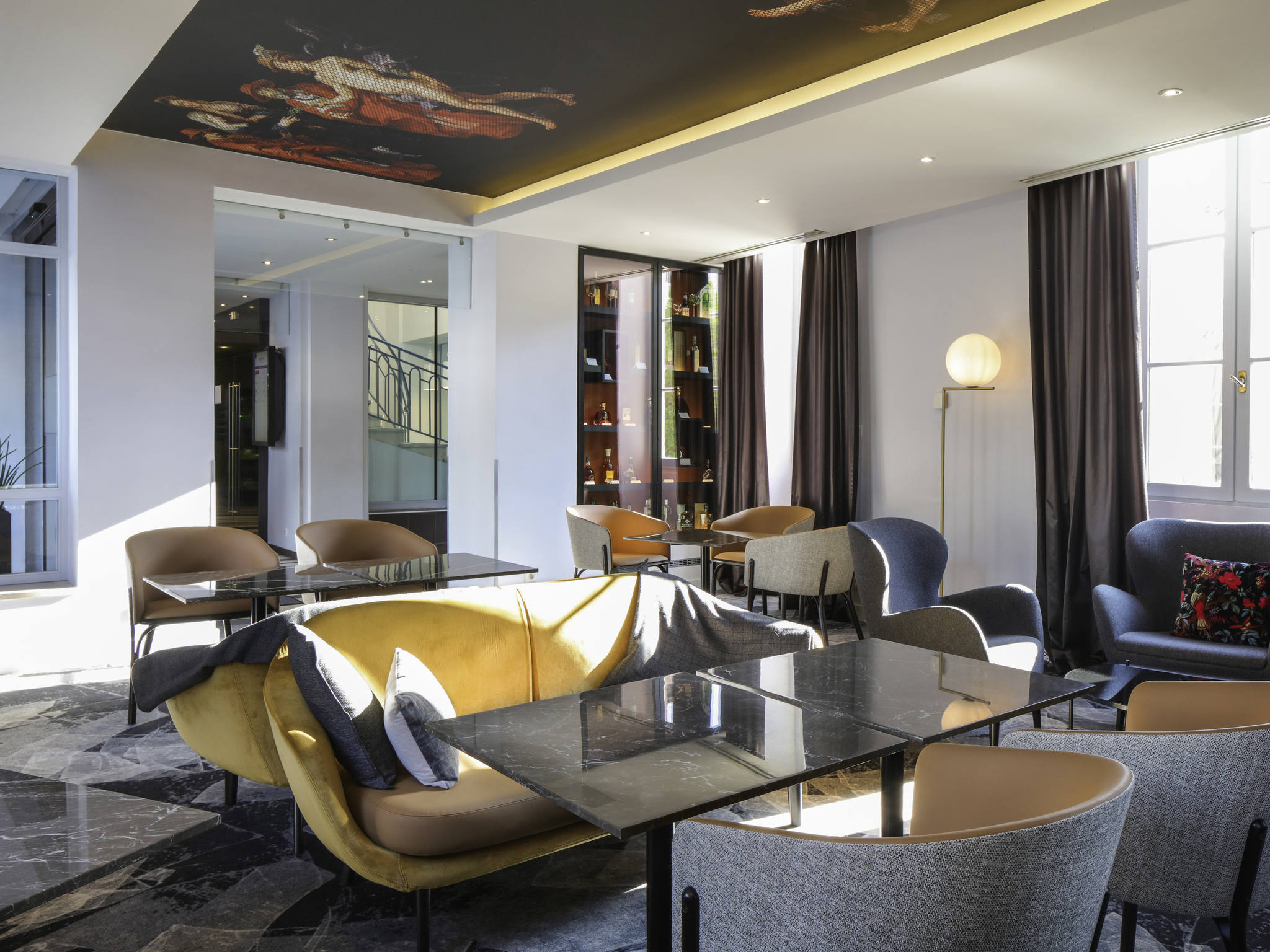 a room with tables and chairs