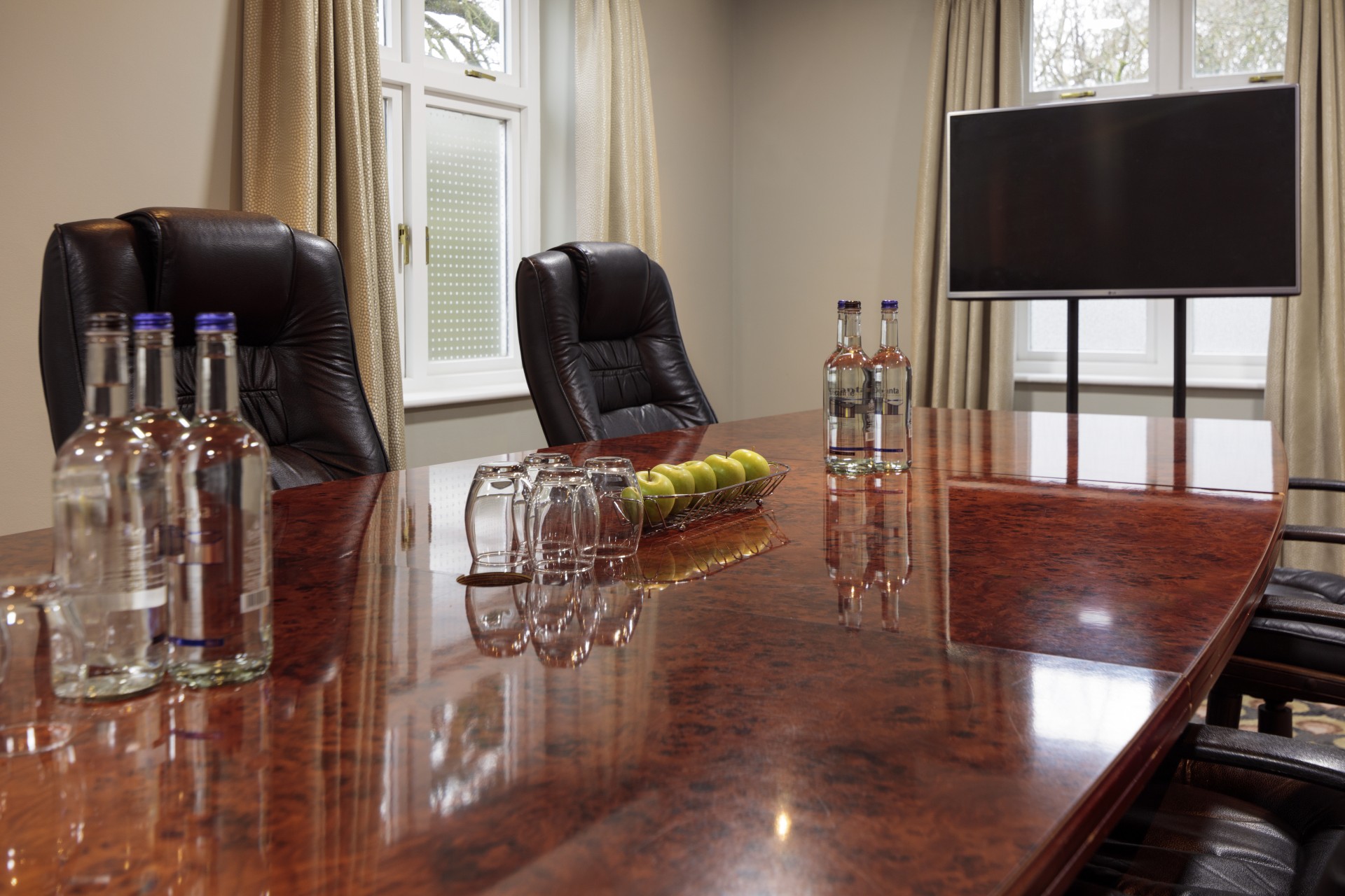 a table with glasses and bottles on it