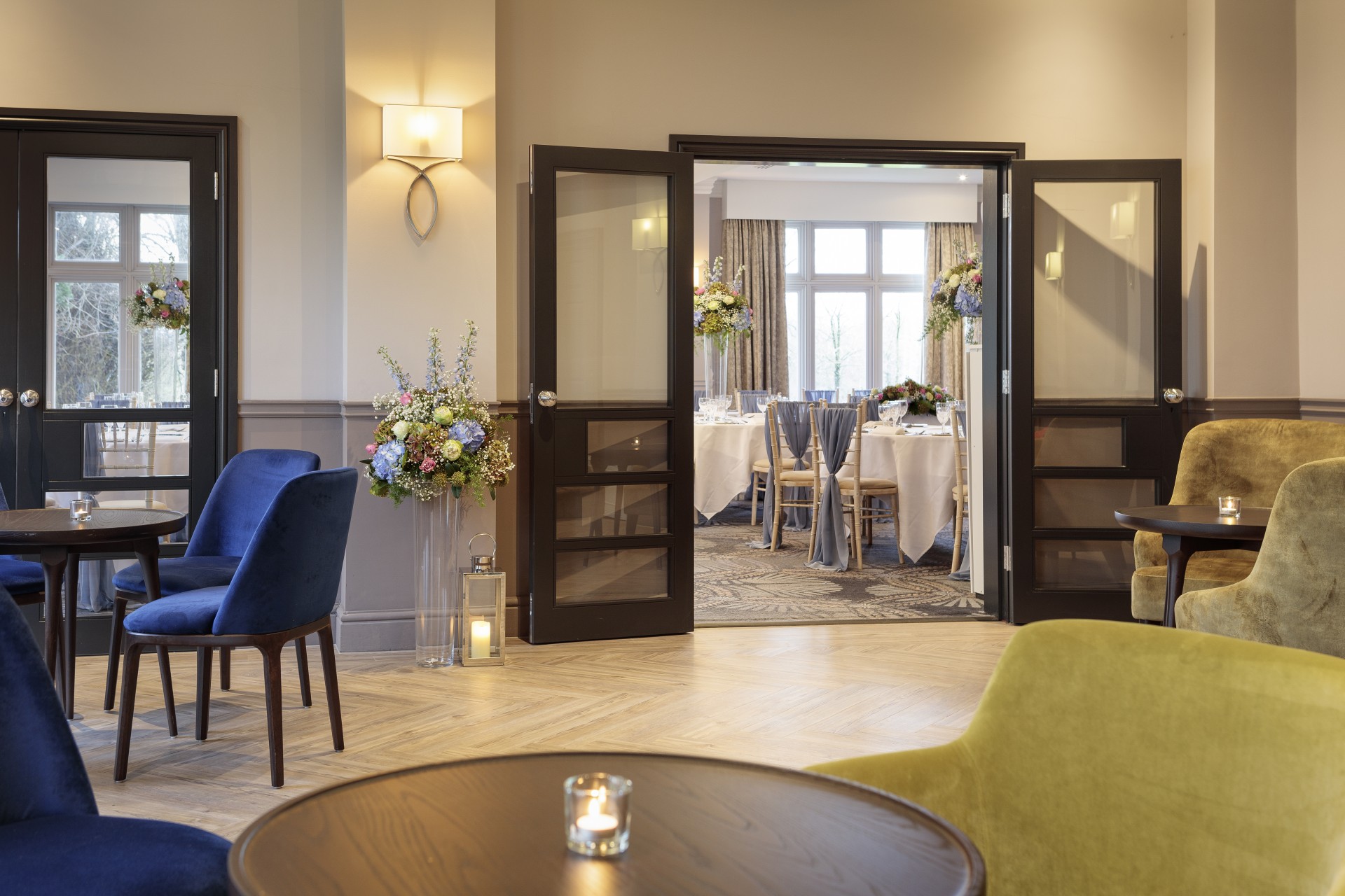 a room with chairs and tables and a table with chairs and a table with a table and chairs