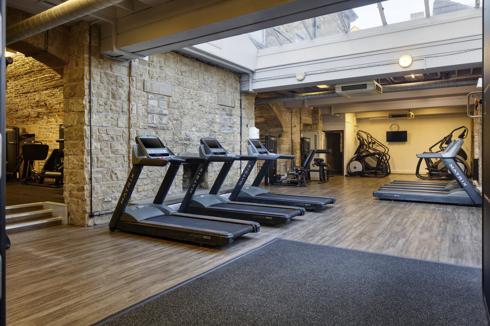 a room with treadmills and treadmills