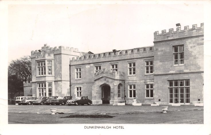 a building with cars parked in front of it
