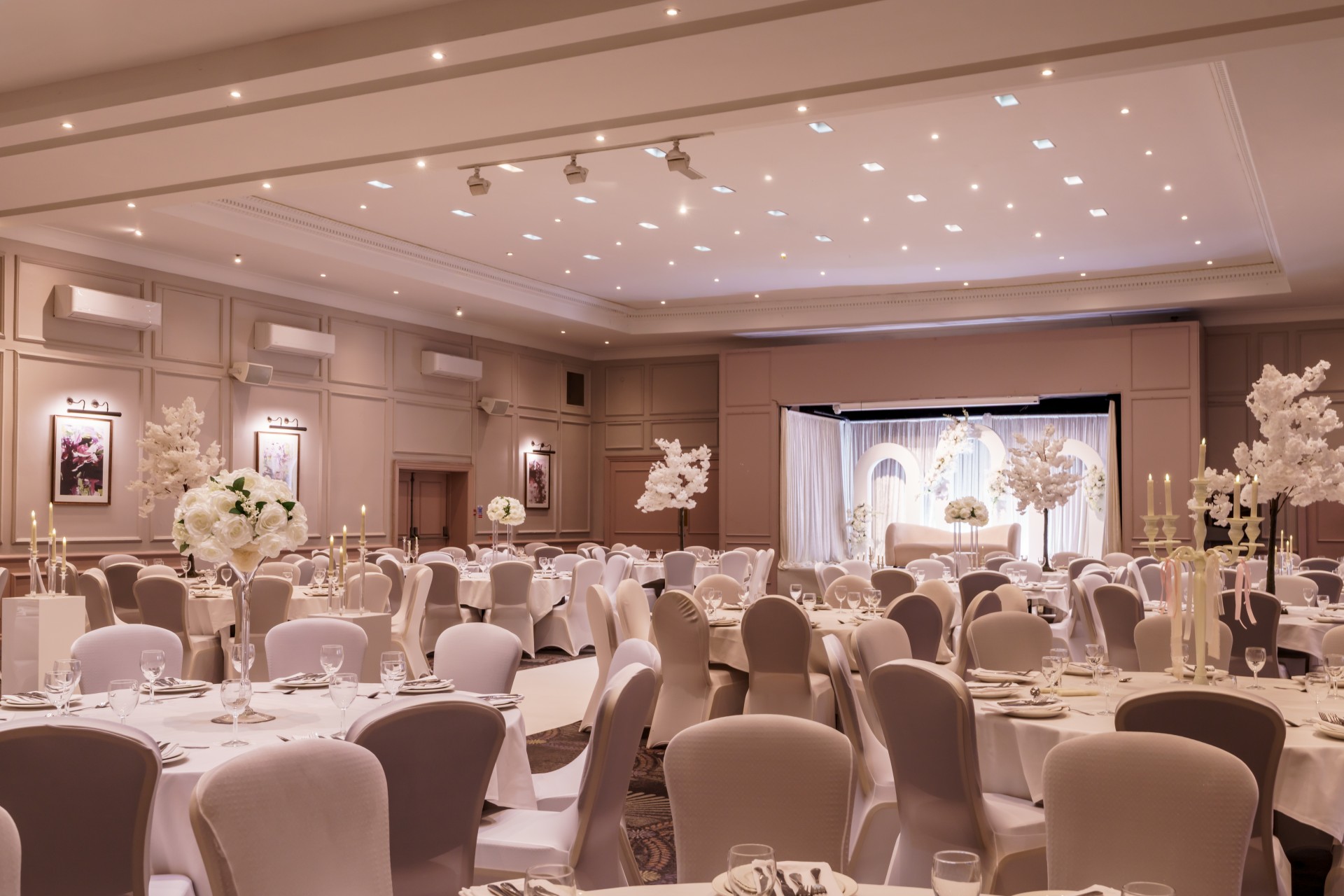 a room with tables and chairs