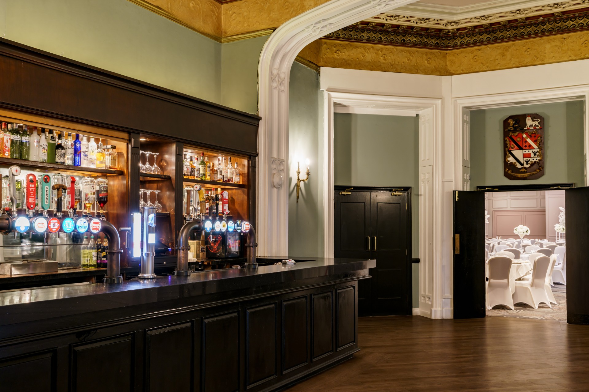 a bar with liquor bottles in a room