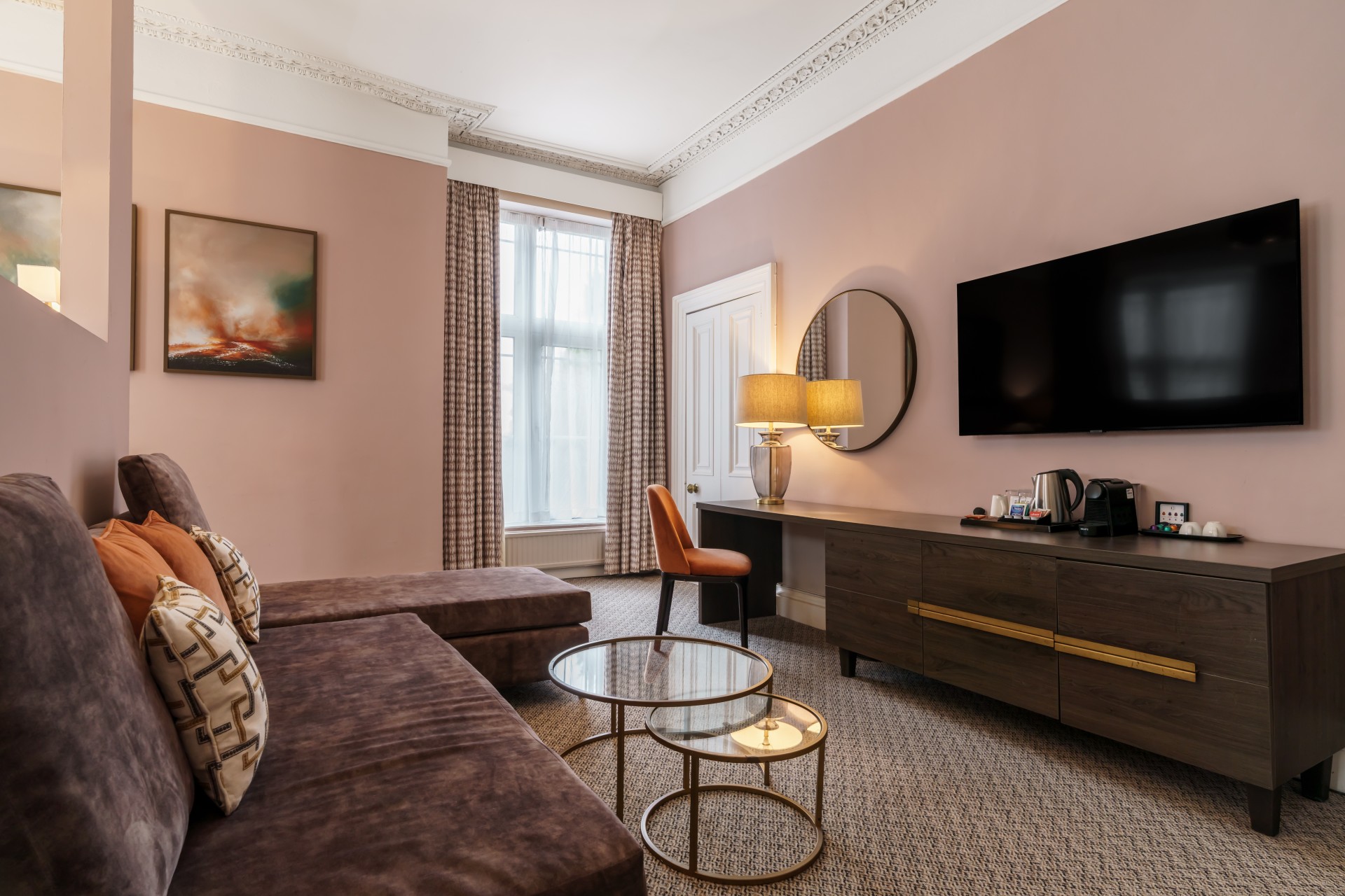 a room with a couch and a television