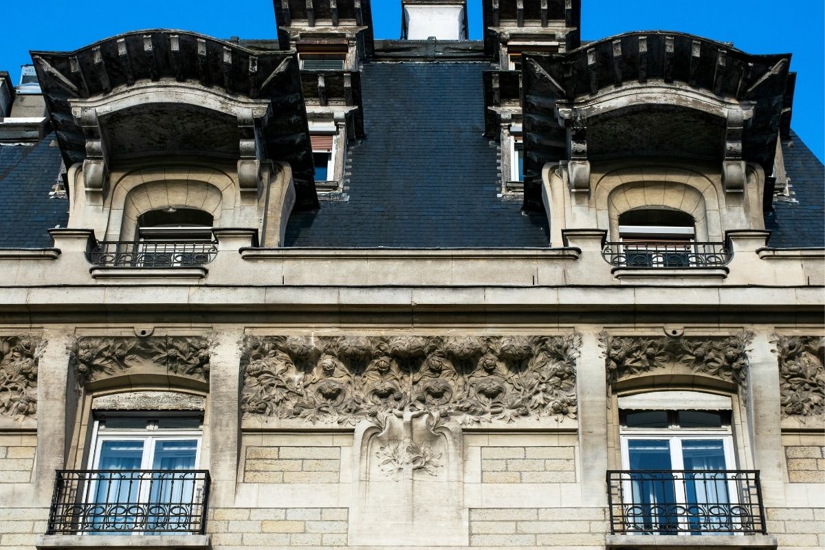 a building with a black roof