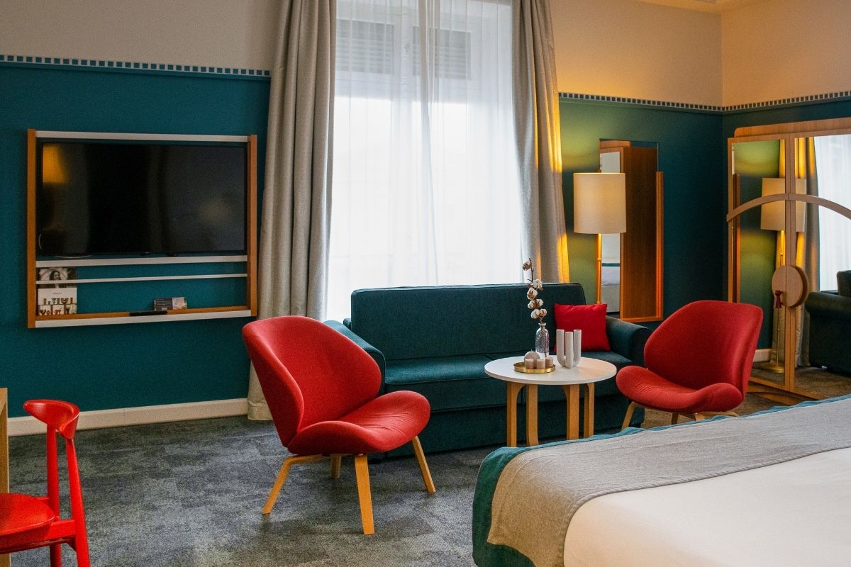 a room with a bed and a couch