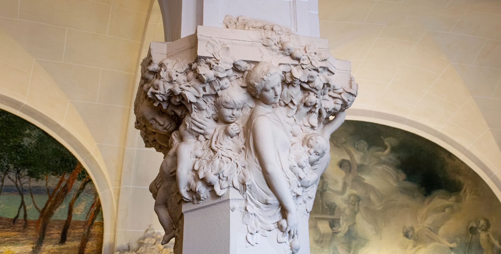 a statue of a woman and children