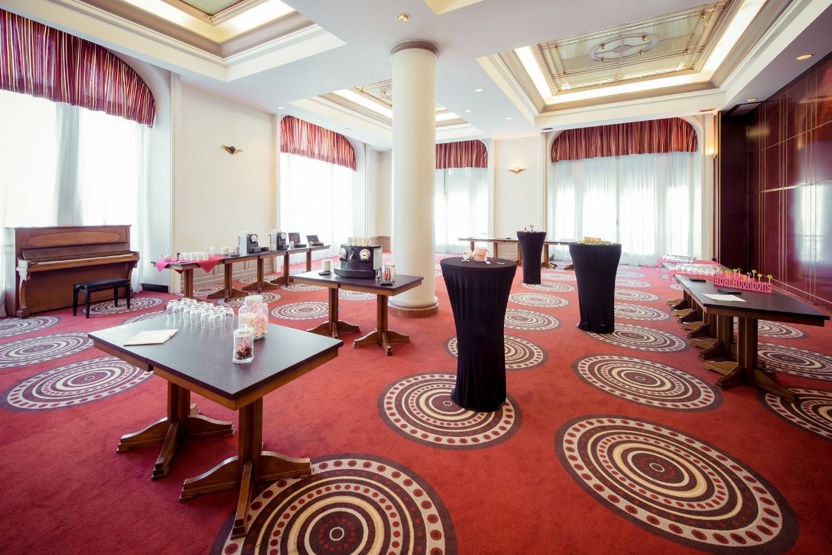 a room with tables and chairs