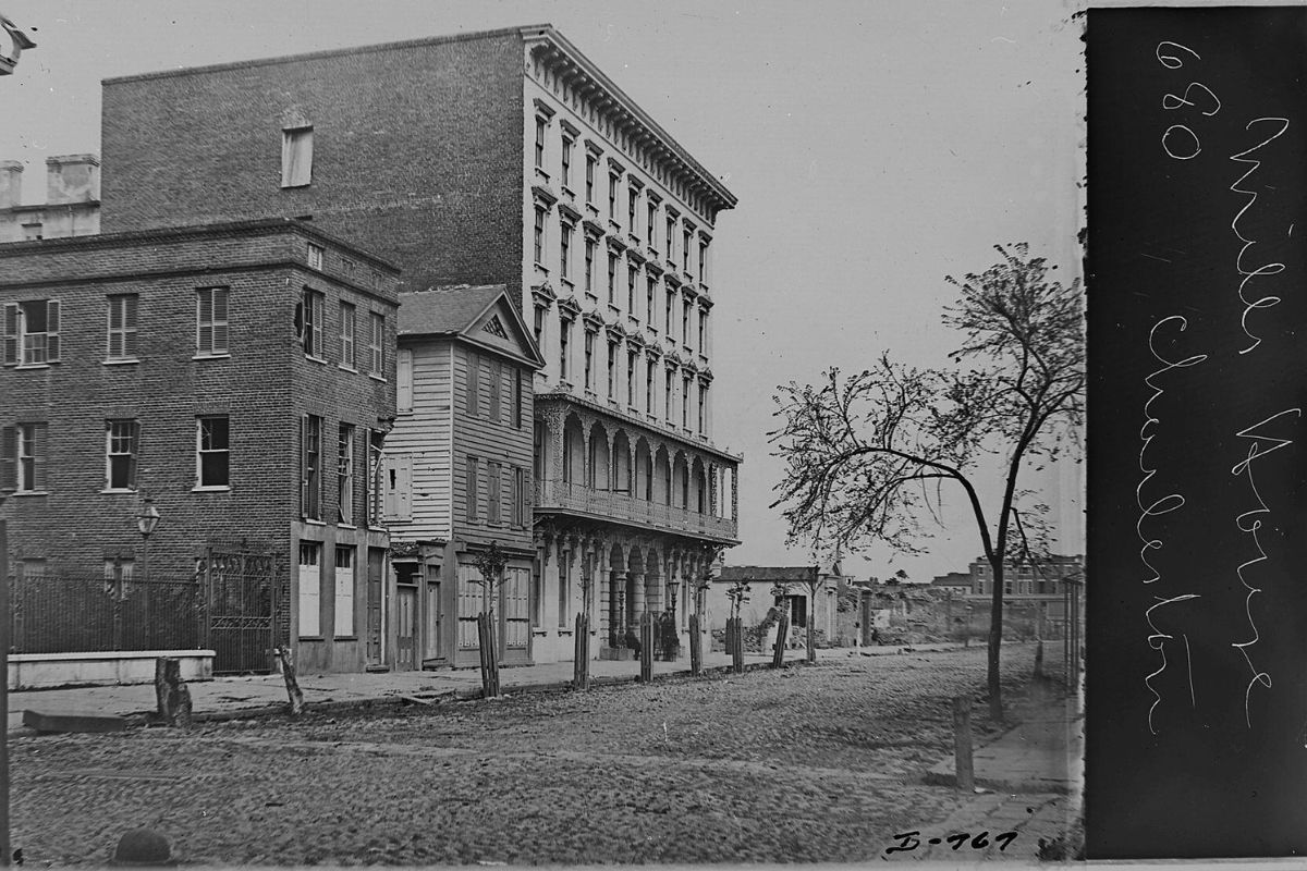 a street with buildings and trees