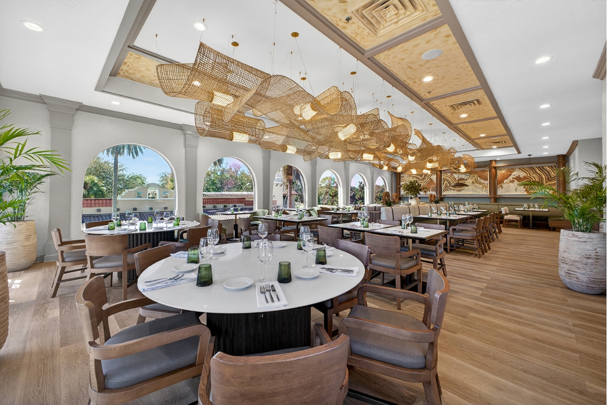 a large room with tables and chairs