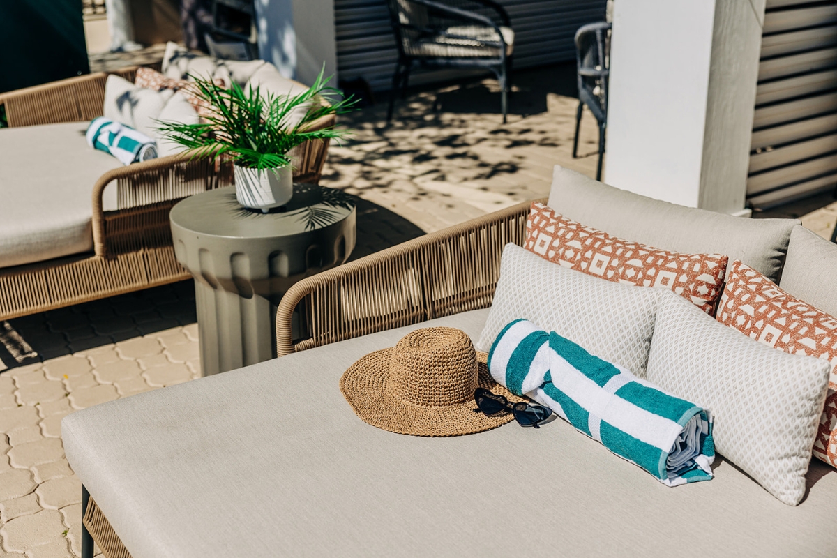 a table with a towel and a hat on it