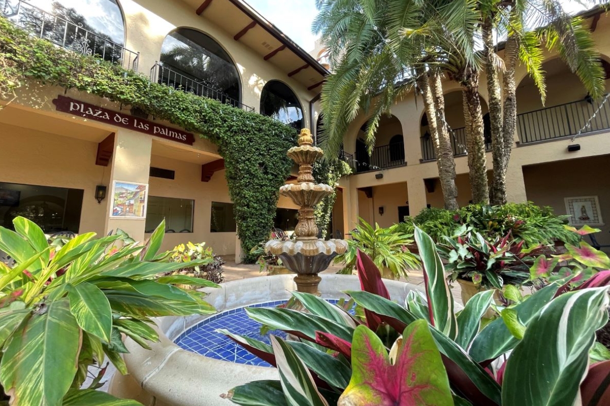 a fountain in front of a building