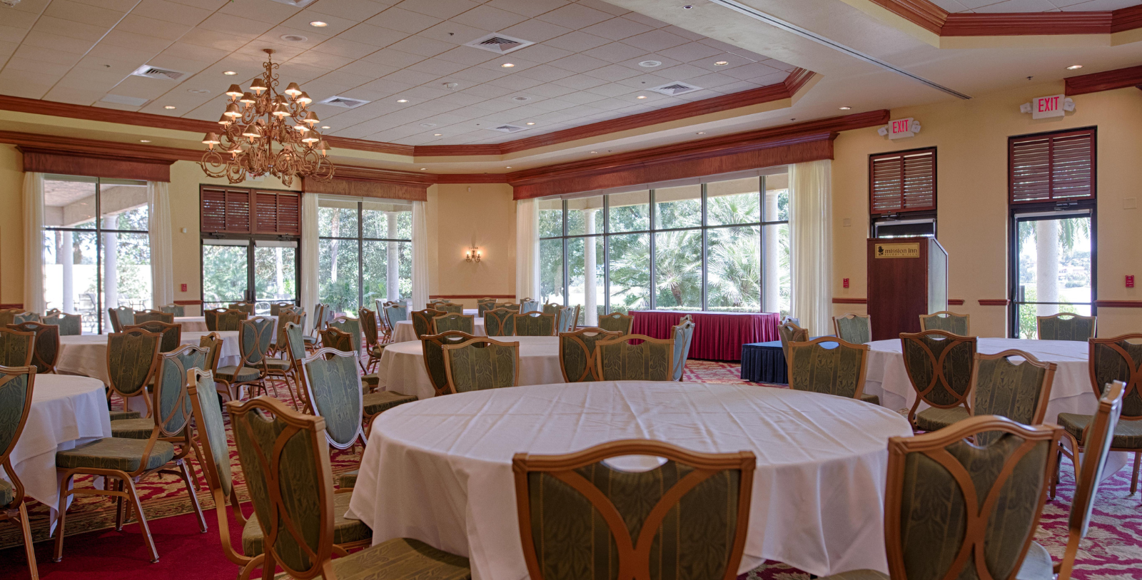 a room with tables and chairs