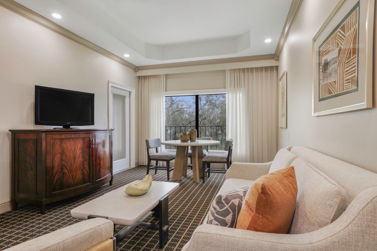 a room with a television and a table