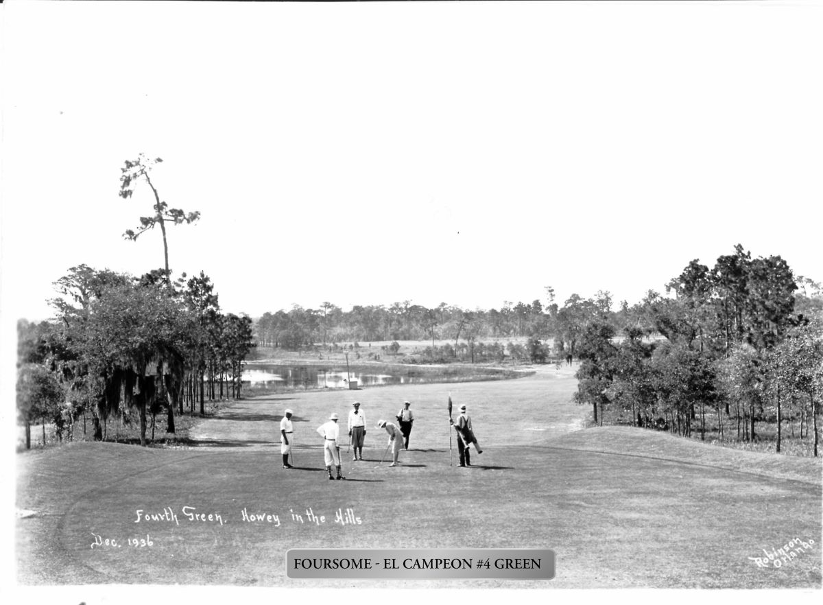 a group of men playing golf