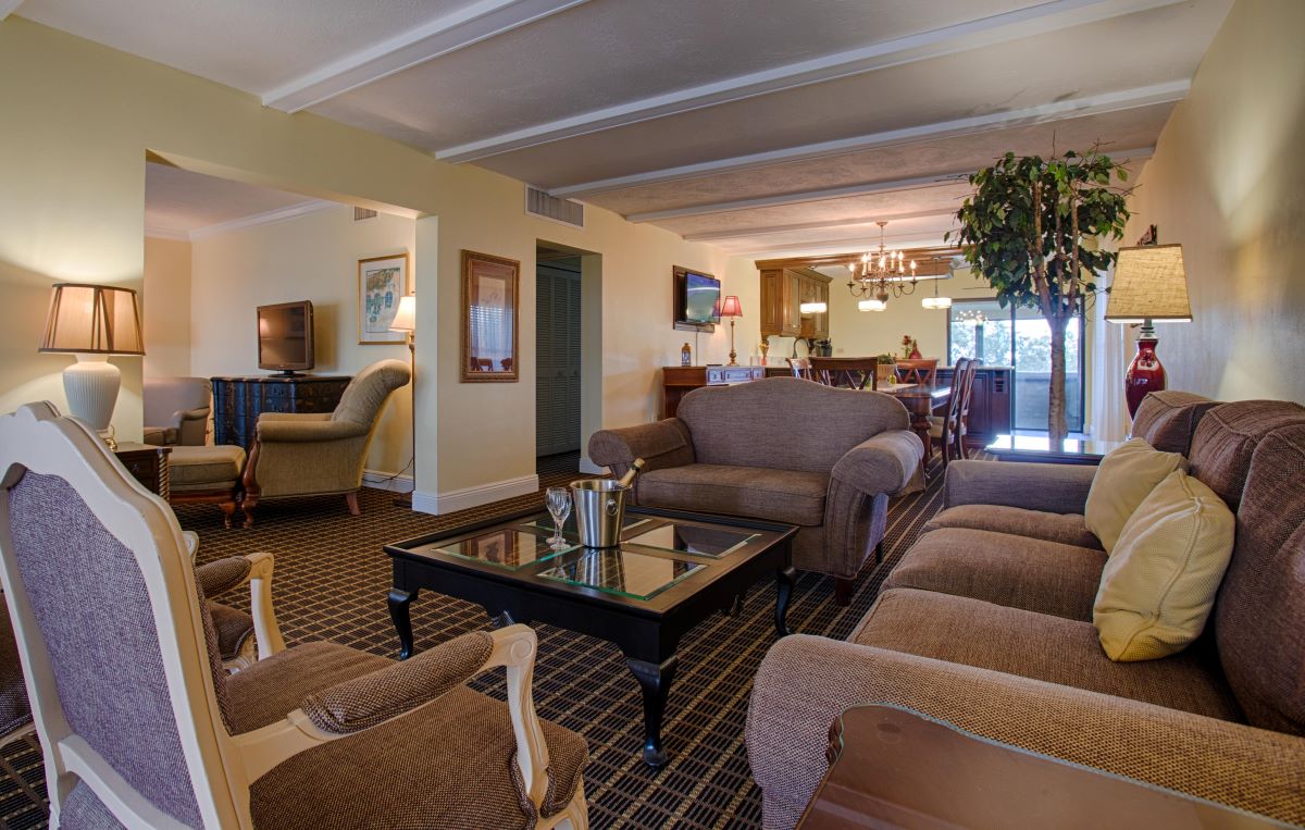 a living room with couches and a table