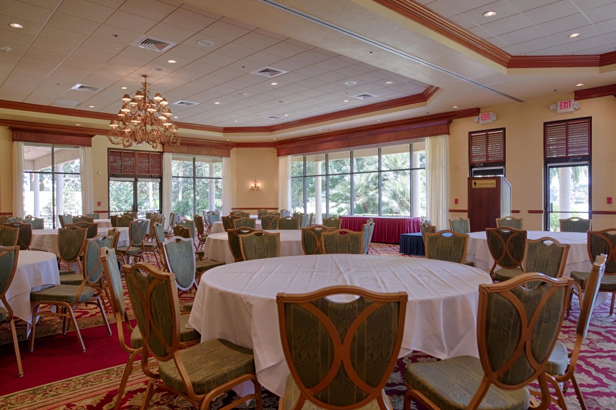 a room with tables and chairs
