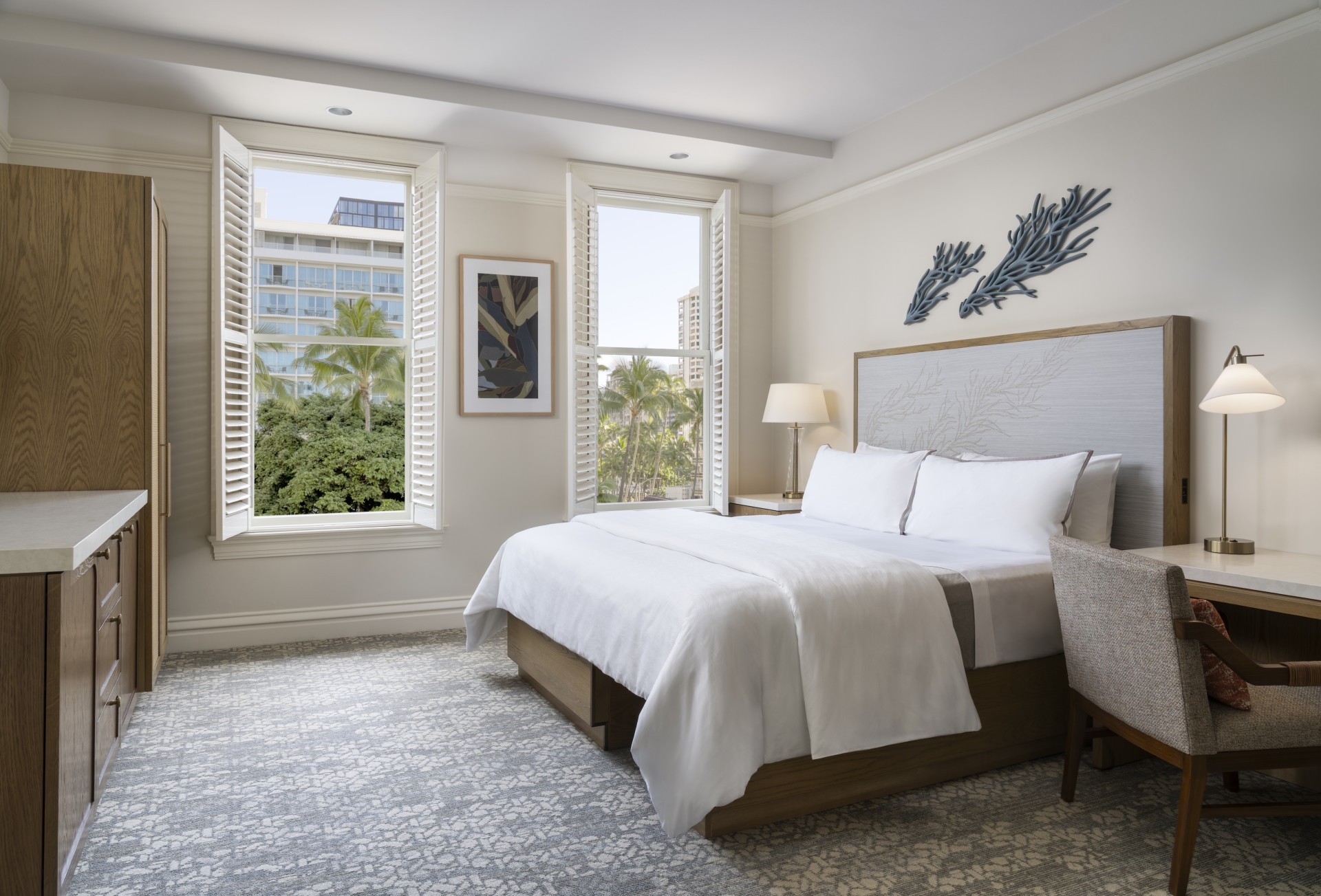 a bedroom with a bed and a chair