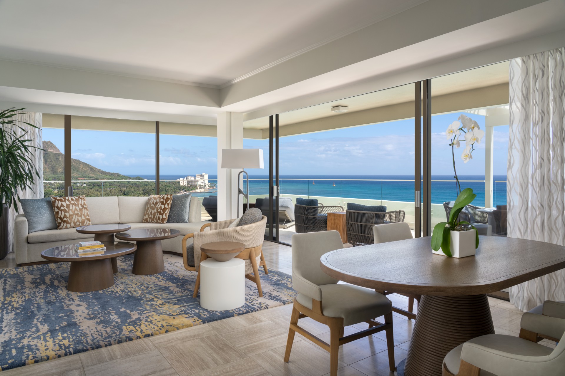 a room with a large window overlooking the ocean