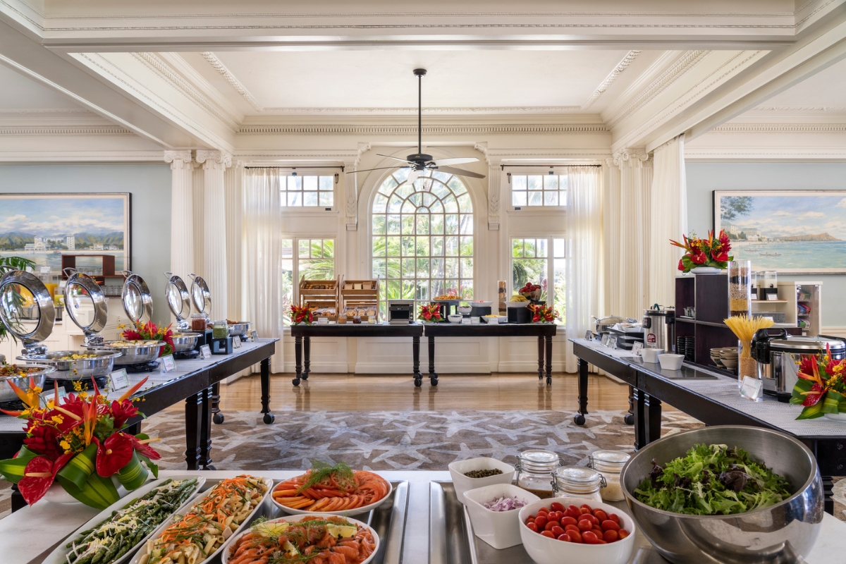 a buffet table with food in it