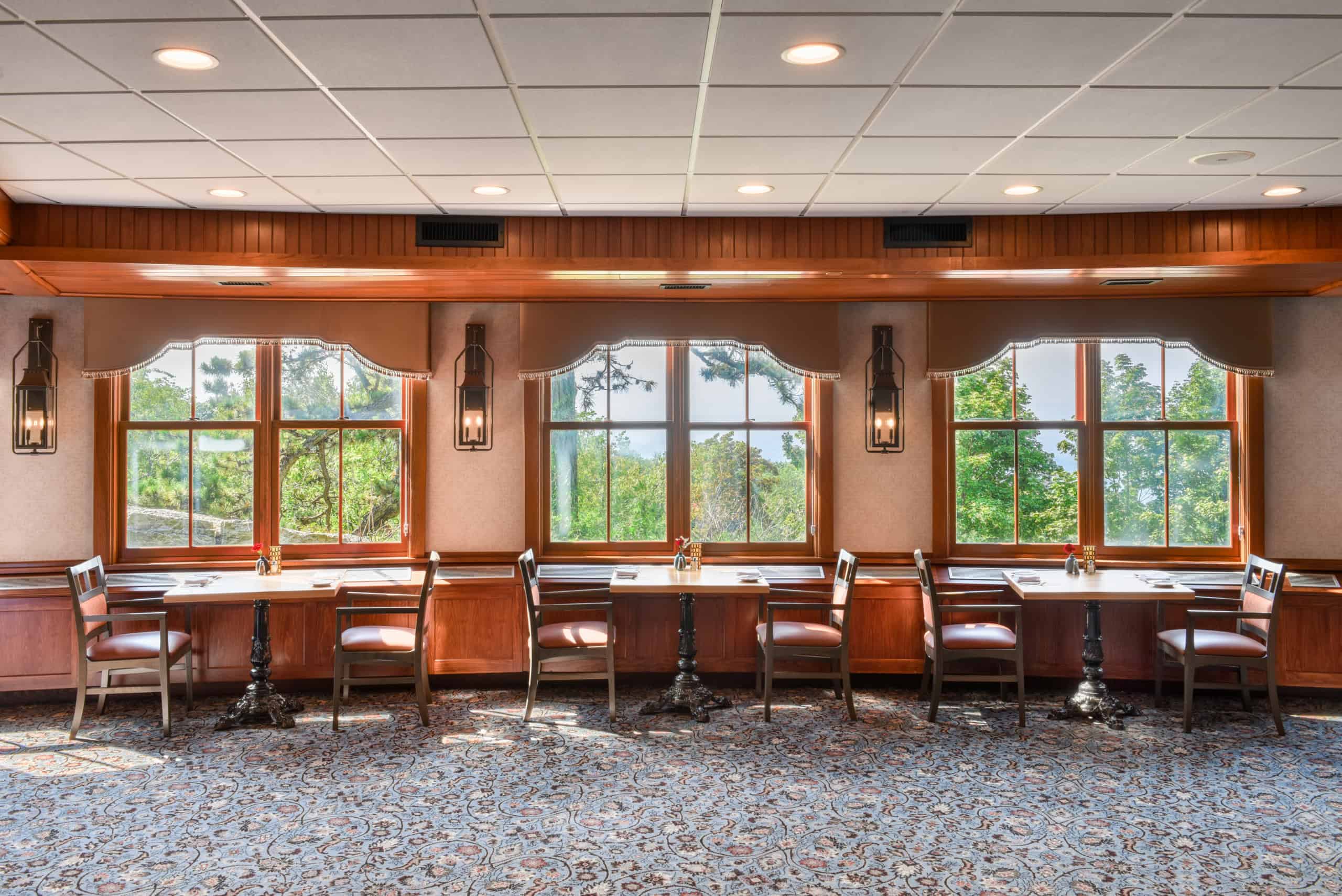 a room with tables and chairs