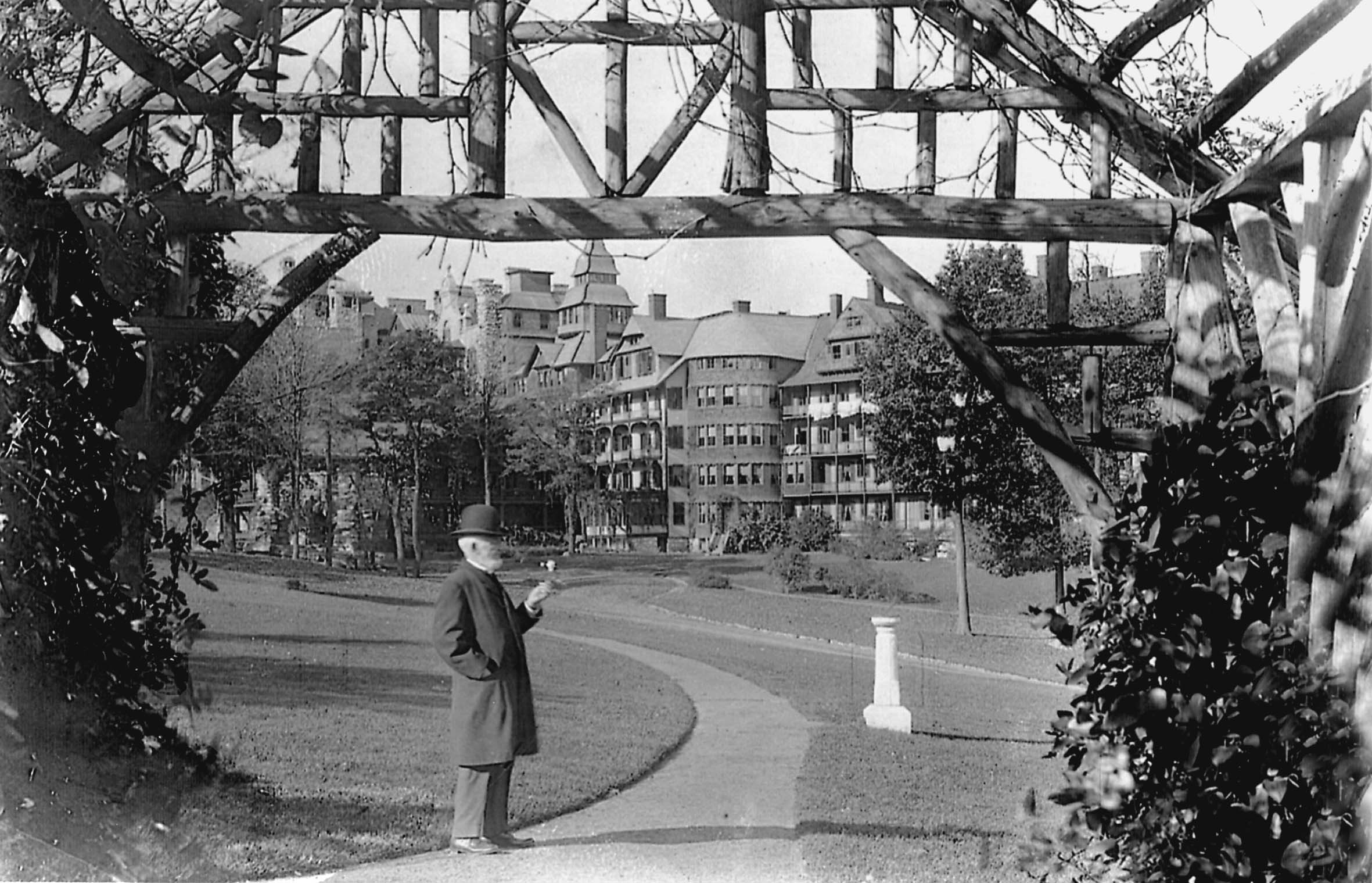 a man standing under a structure