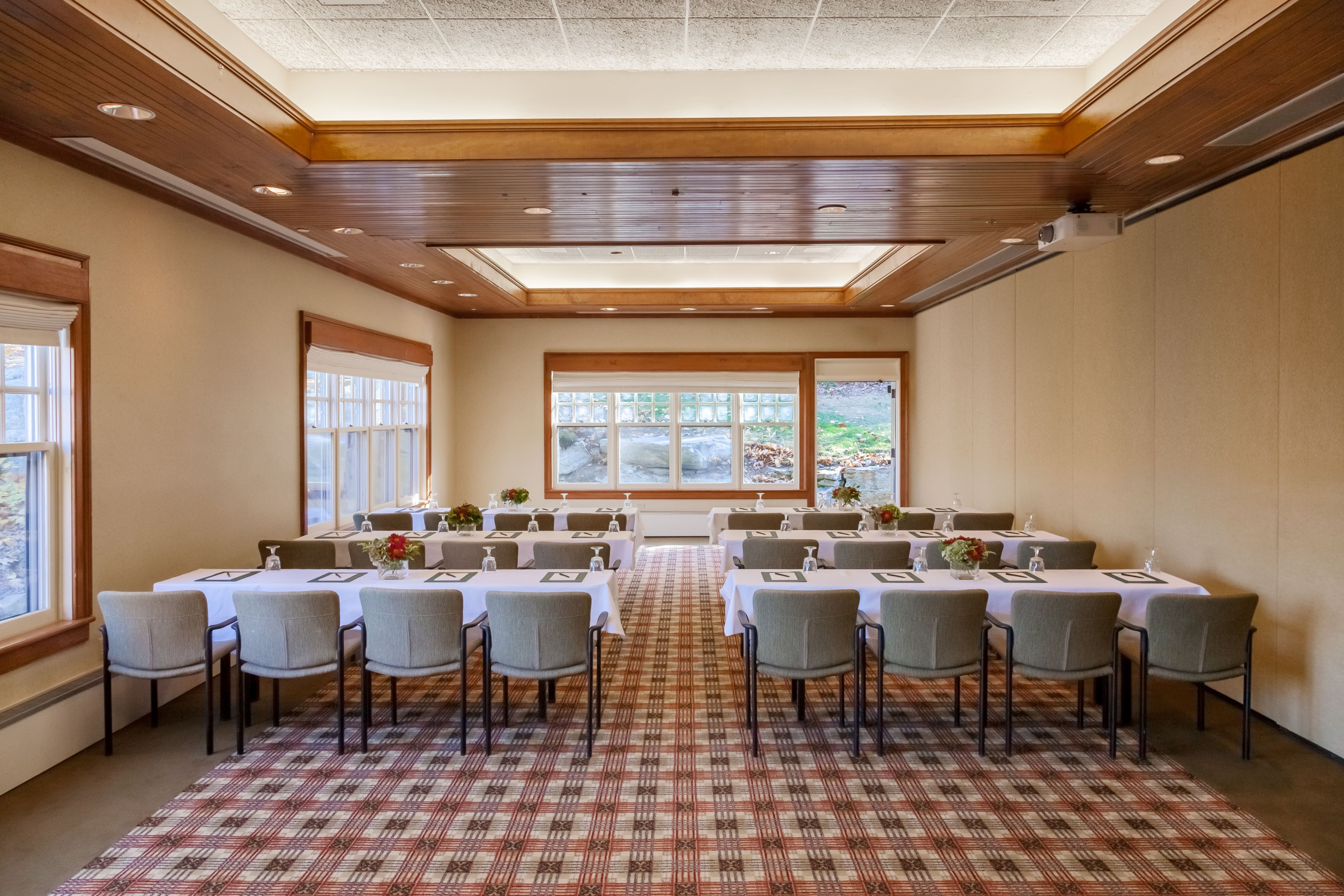 a room with tables and chairs
