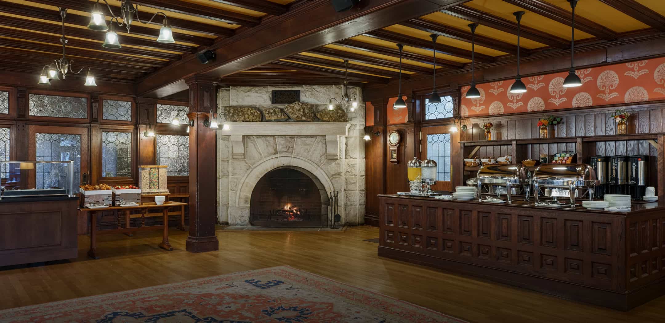 a room with a fireplace and a wood floor