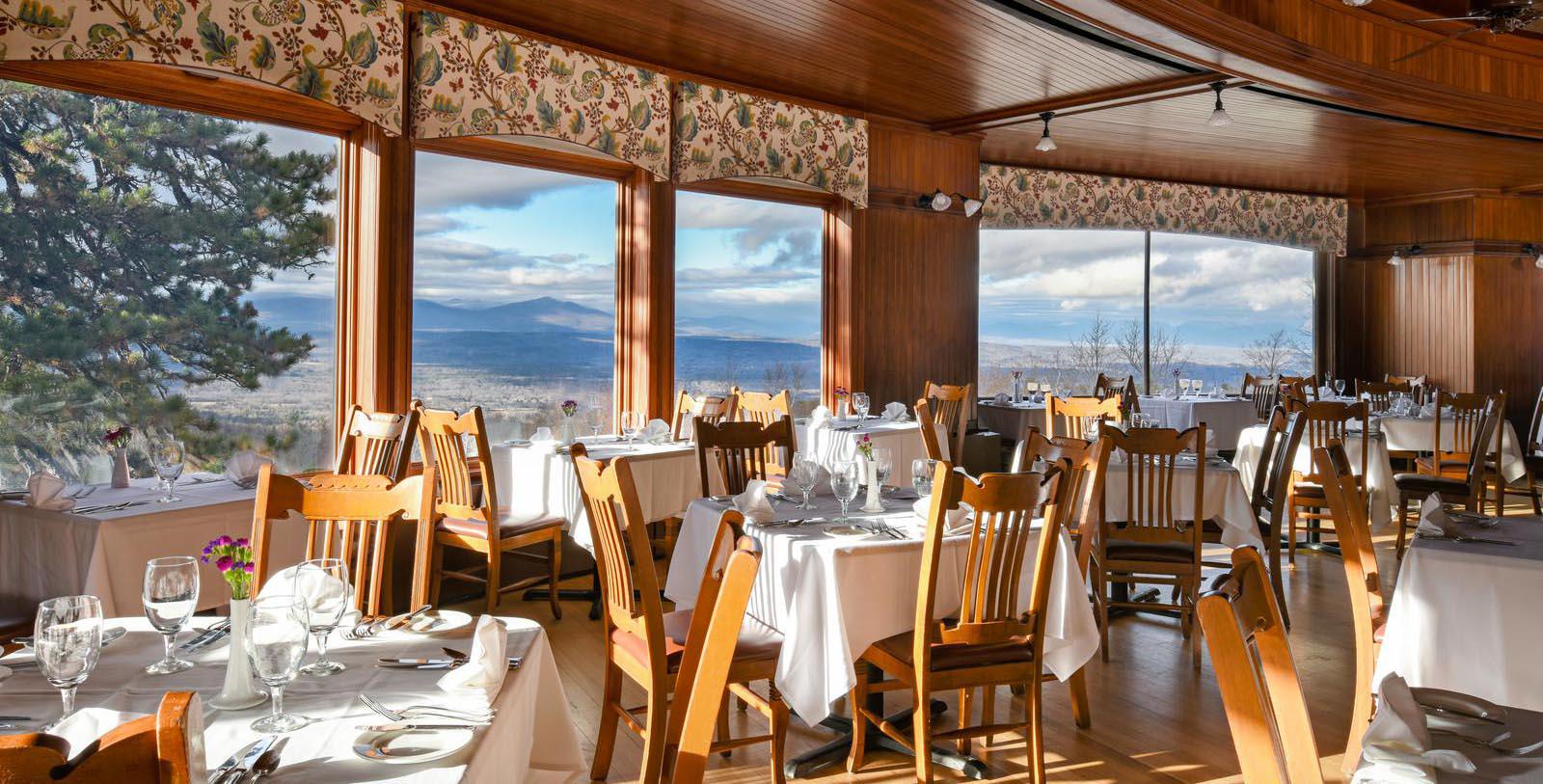 a restaurant with tables and chairs