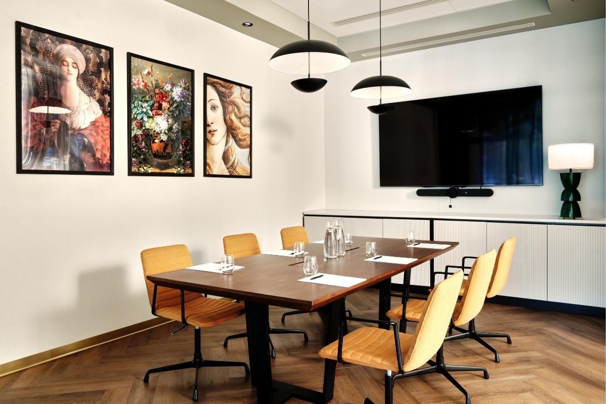 a room with a table and chairs