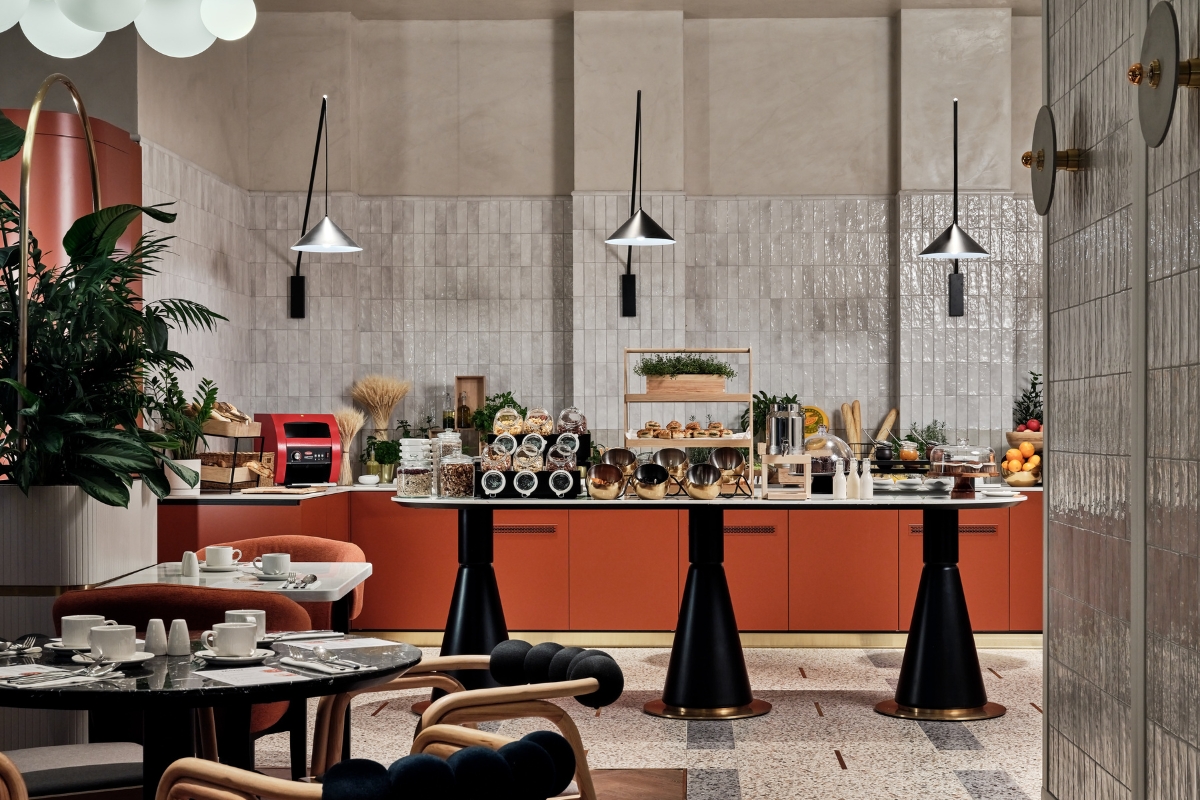 a kitchen with a table and chairs