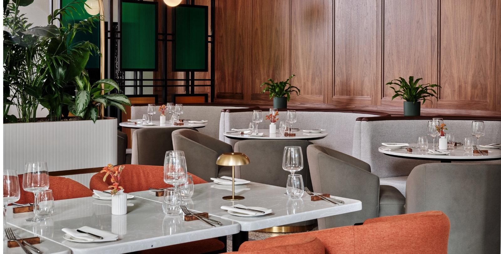 a restaurant with tables and chairs