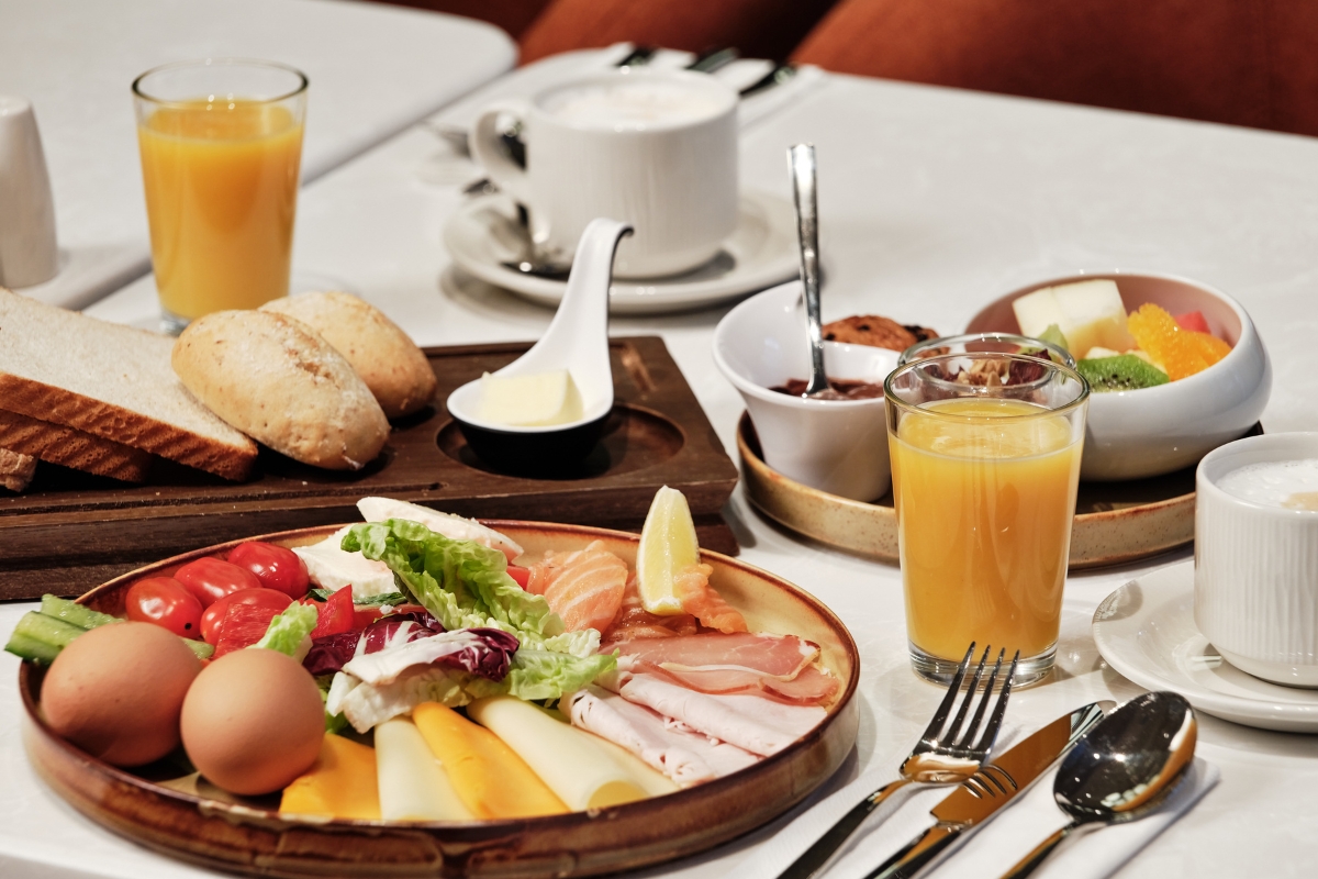 a plate of food and drinks on a table