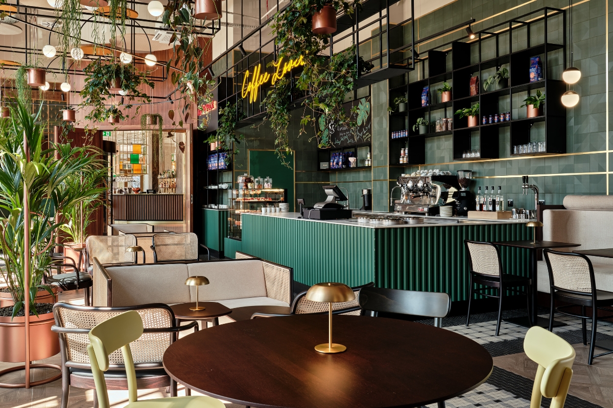 a coffee shop with tables and chairs