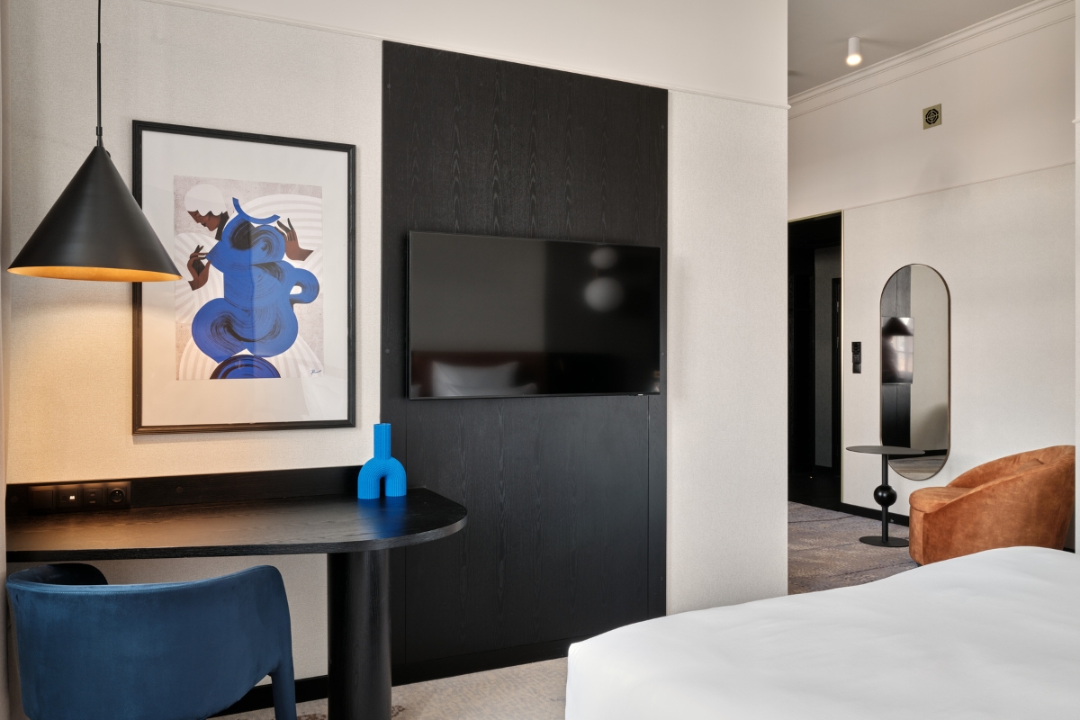 a room with a tv and a table