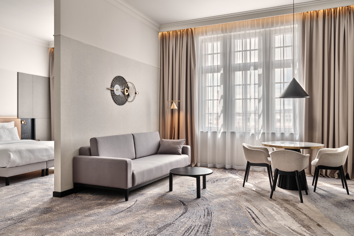 a living room with a couch and table