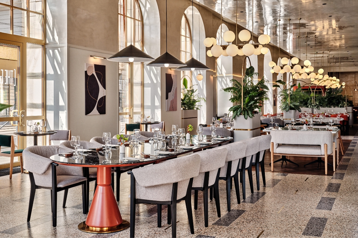 a large room with tables and chairs