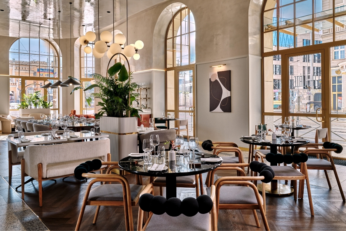 a restaurant with tables and chairs