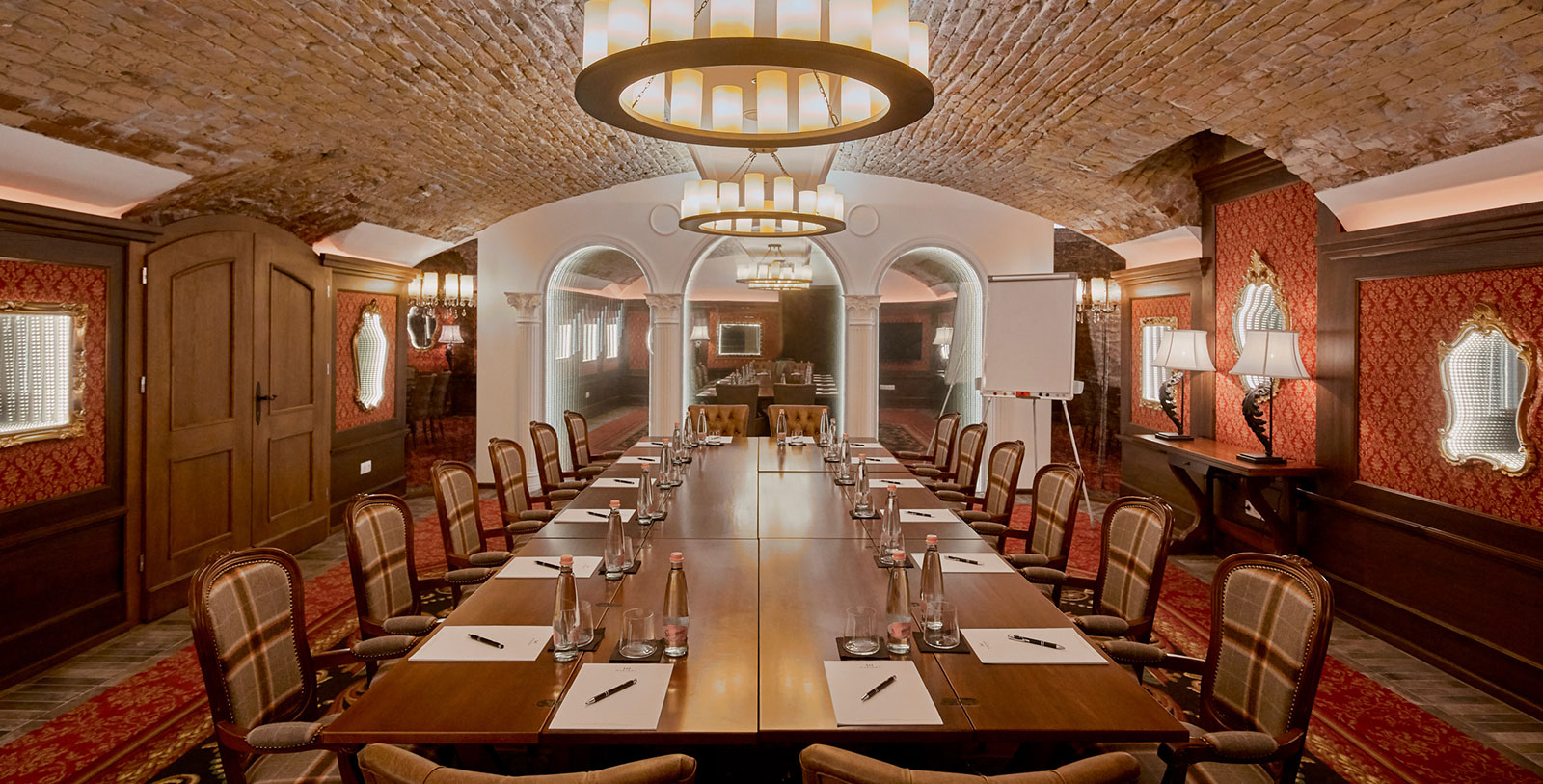 a conference room with a large table and chairs