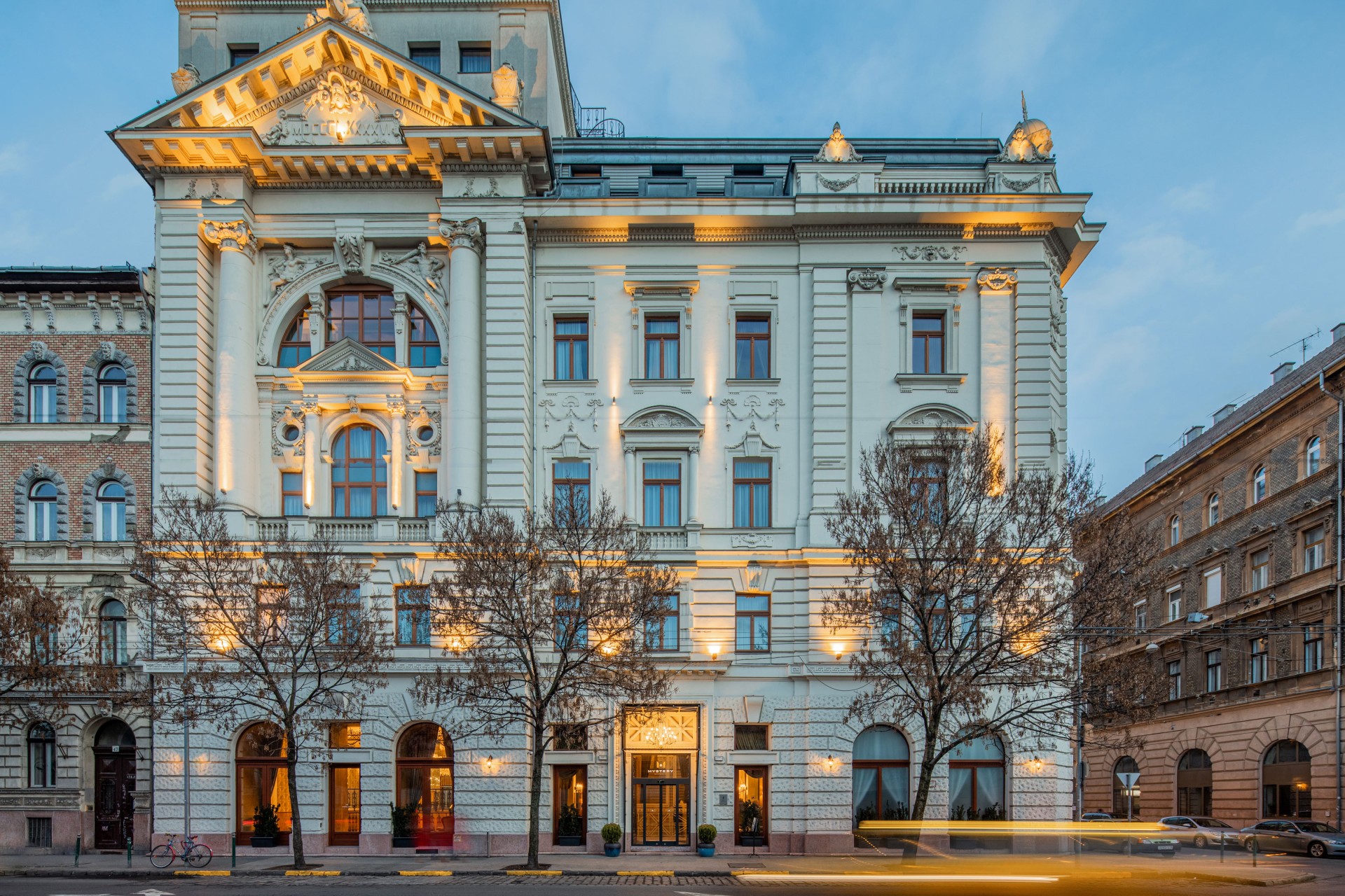 a building with many windows and lights